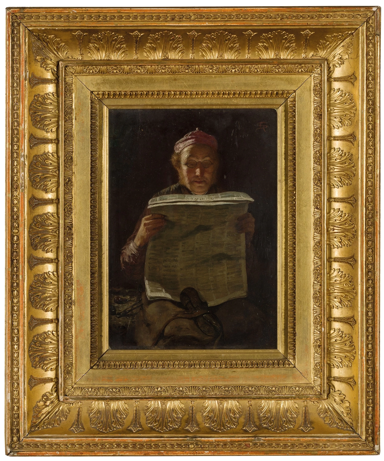 Calzolaio attento a leggere il giornale